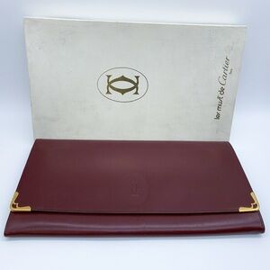 Cartier Les Must de Cartier Burgundy Leather Calfskin Clutch with Gold Details